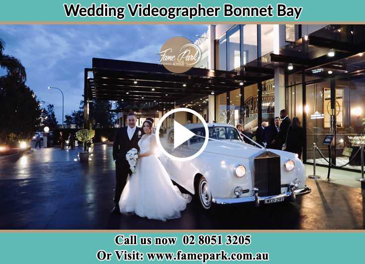 Bride and Groom standing near their bridal car Bonnet Bay NSW 2226