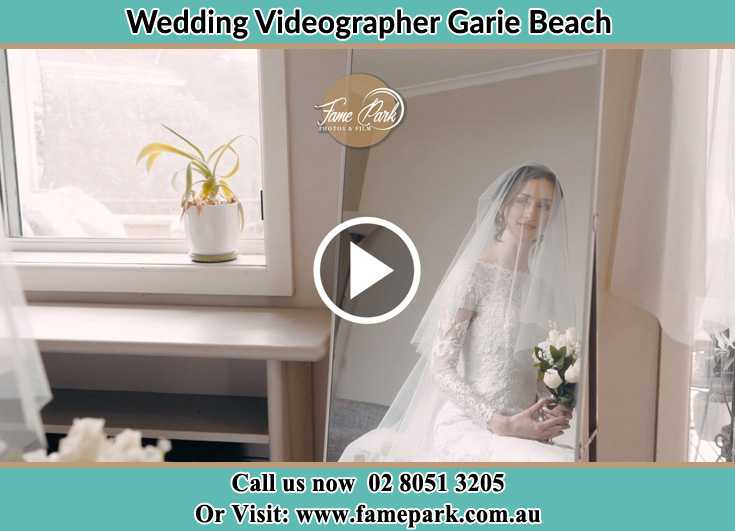 Bride already prepared in front of the mirror Garie Beach NSW 2233