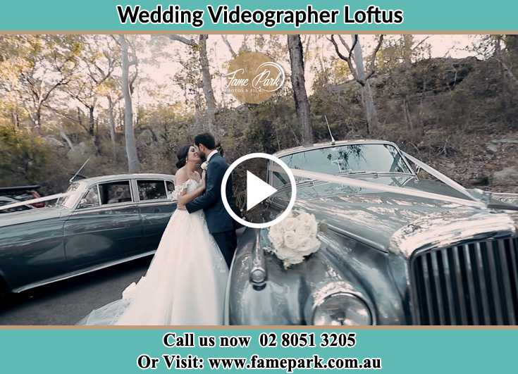 Bride and Groom kissed besides their bridal car Loftus NSW 2232